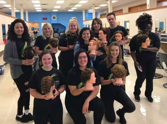 Students at CEC displaying their work