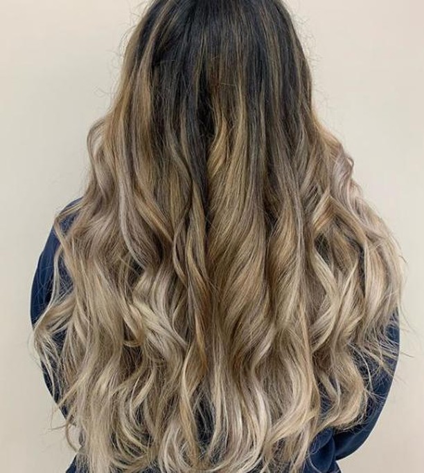 woman long curly hair