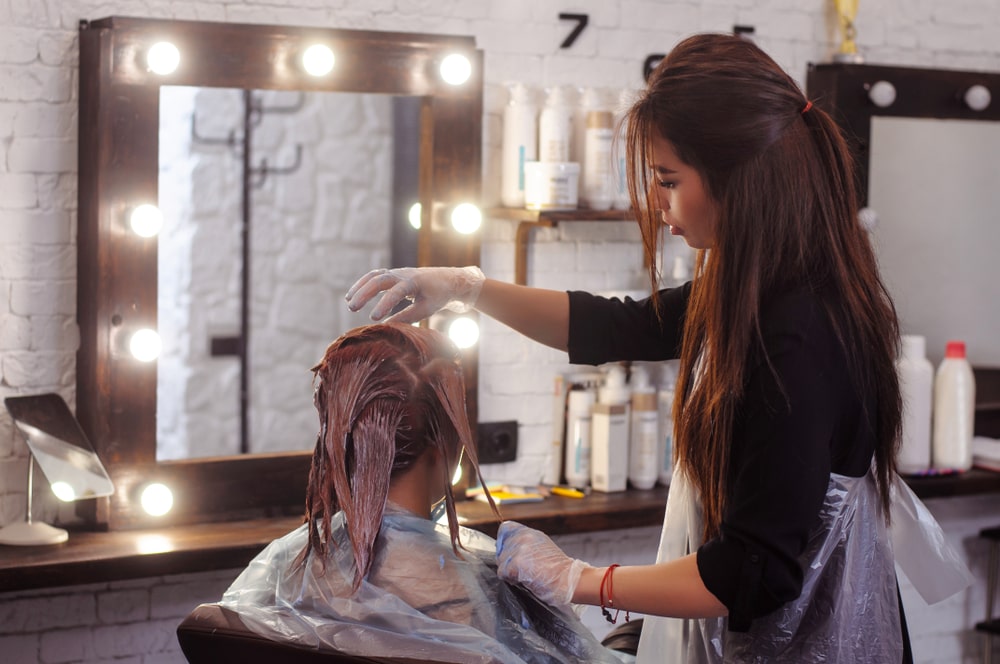 woman dying another woman's hair