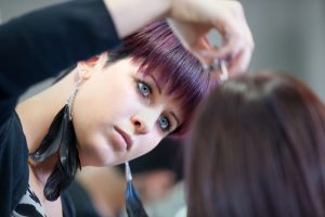 beauty professional applying makeup